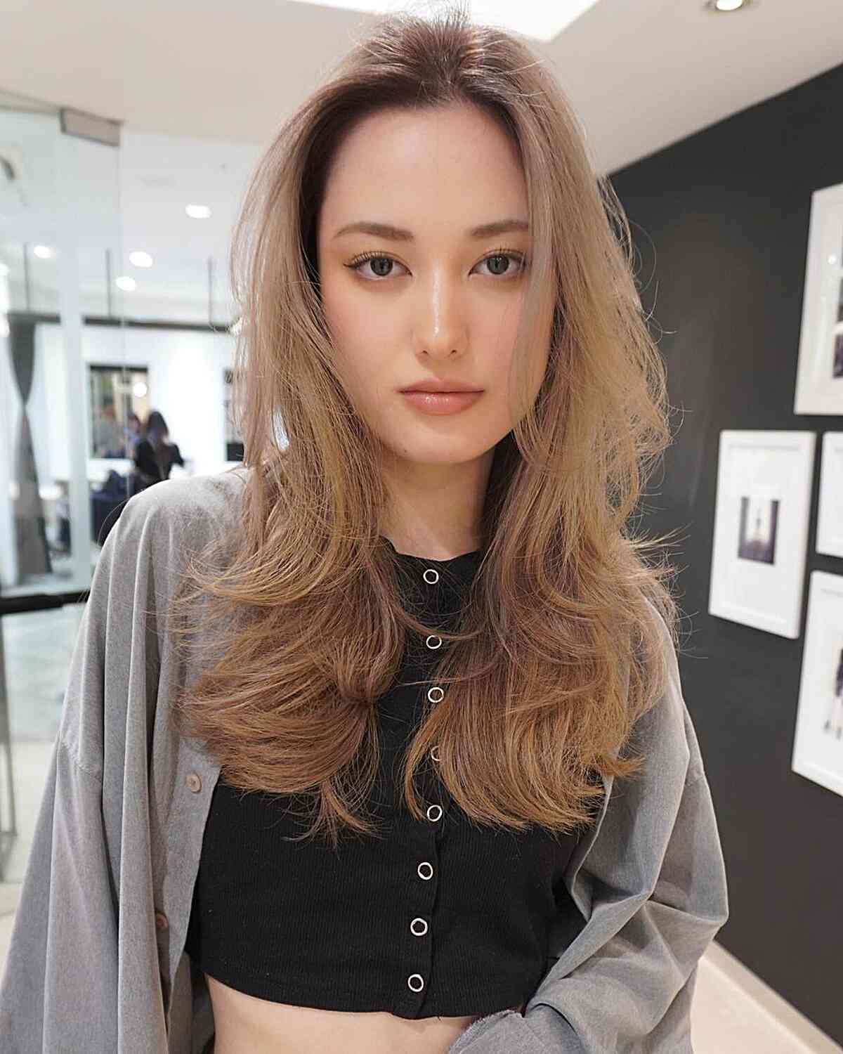 Chest-Length Butterfly Cut with Wispy Layers