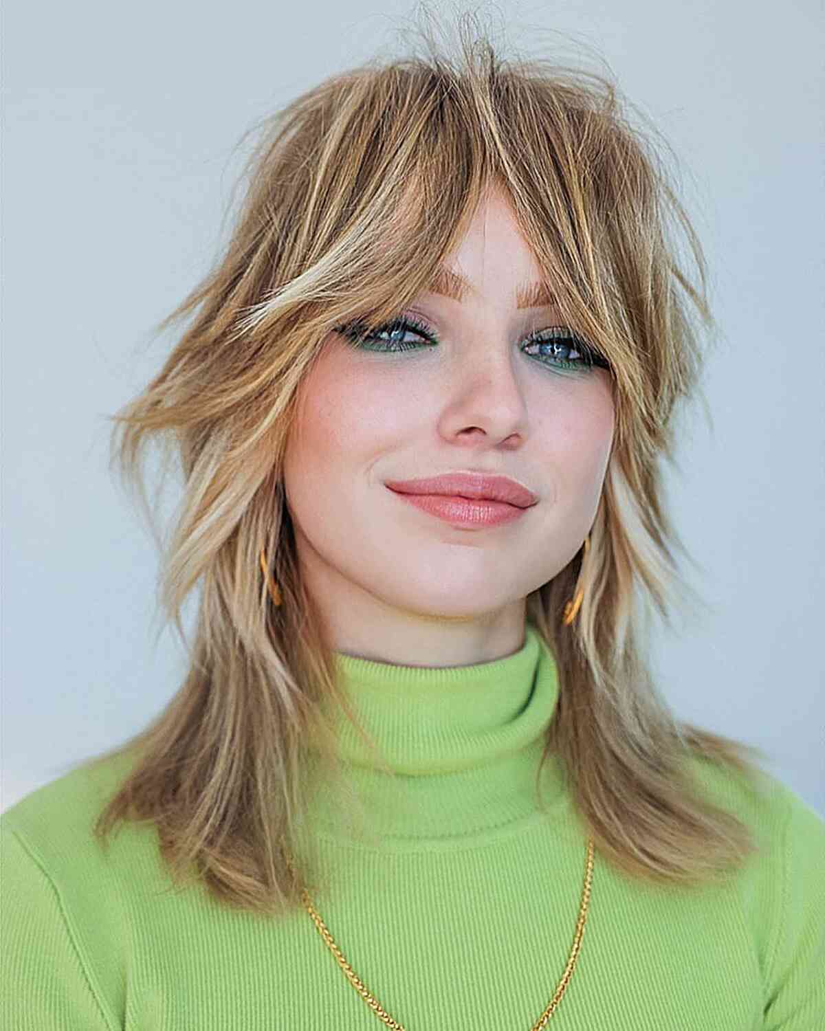 Choppy and Layered Shag with Bottleneck Bangs