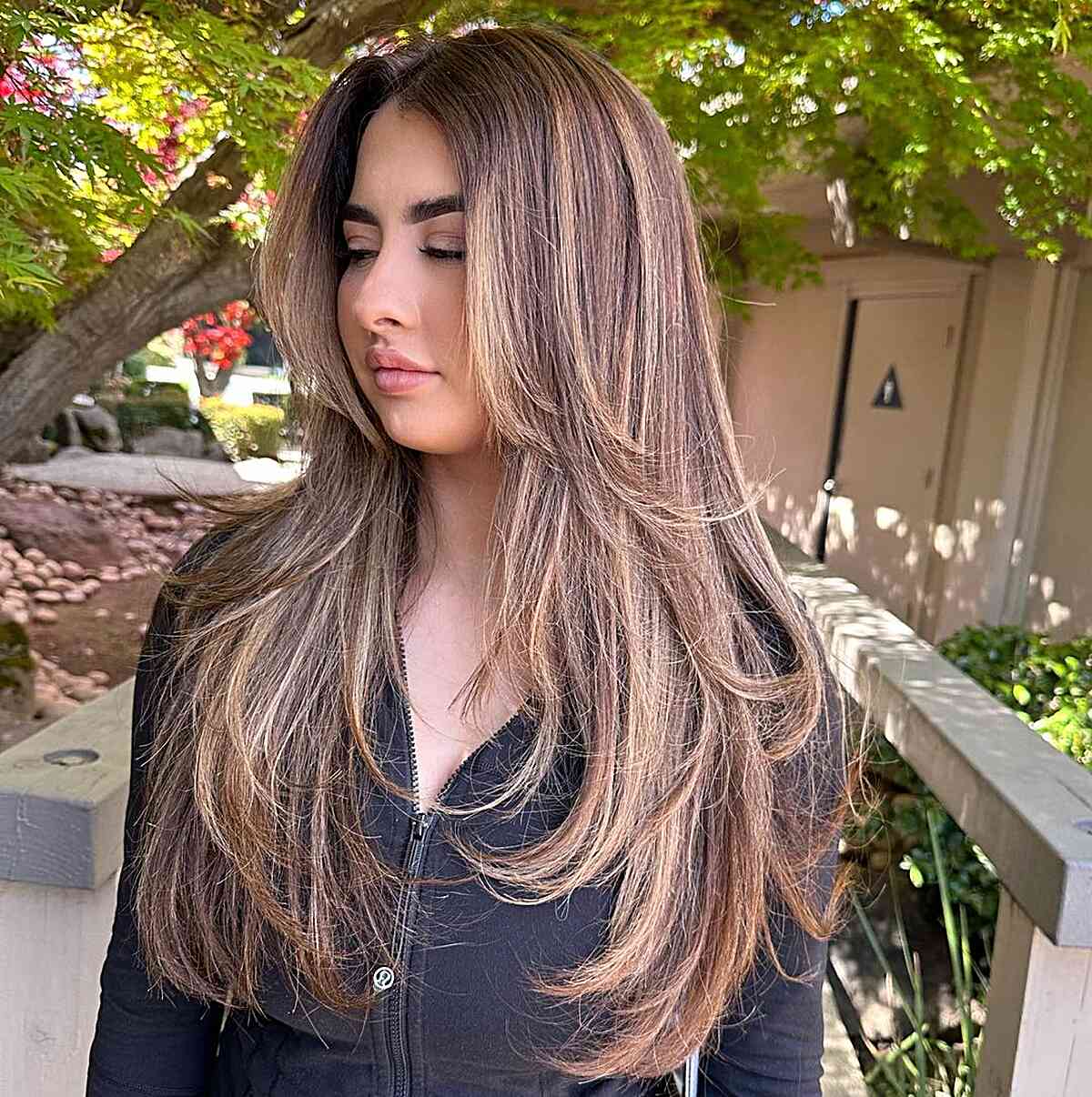 Dimensional Bronde Butterfly Hair with Long Layers for Rounder Face Shapes
