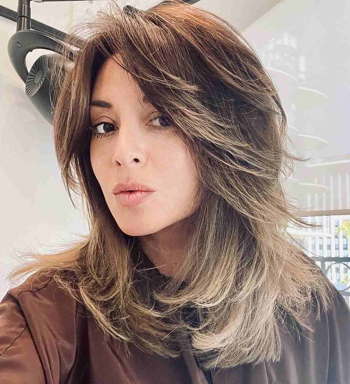 Edgy Medium Feathered Shaggy Cut with Heavy Layers