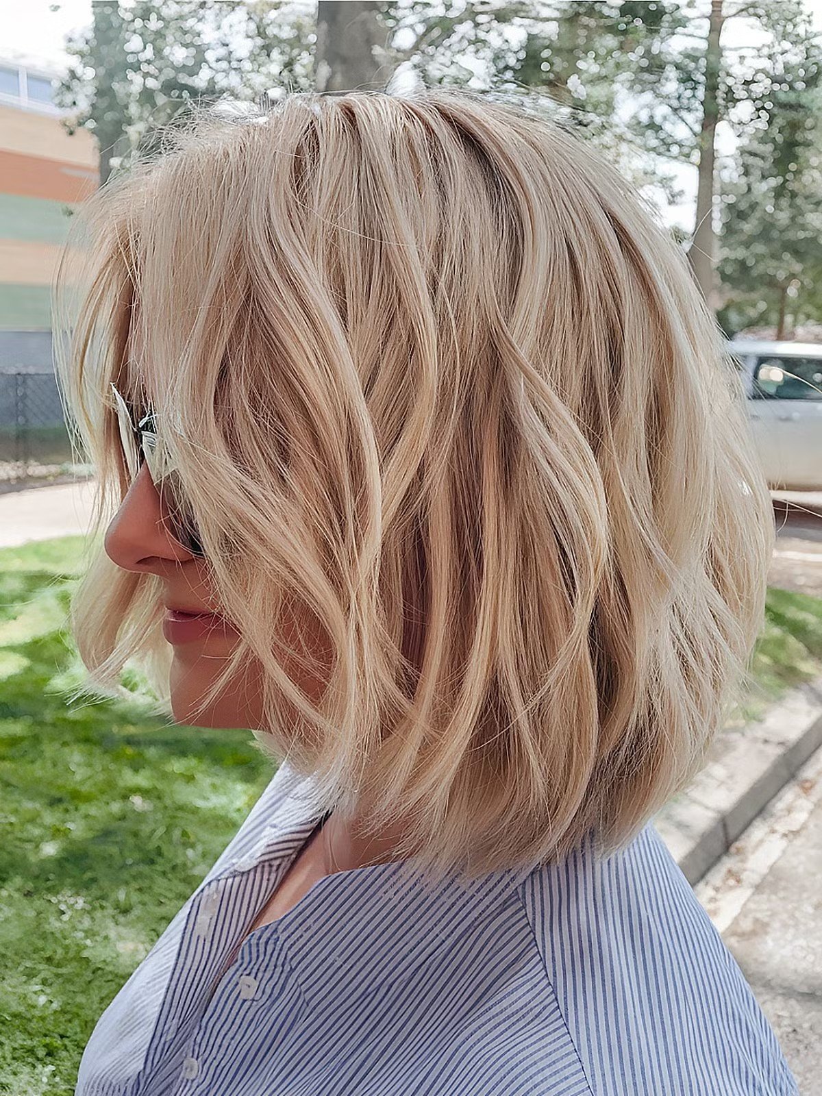 Layered Blonde Bob with Choppy Ends and Subtle Waves