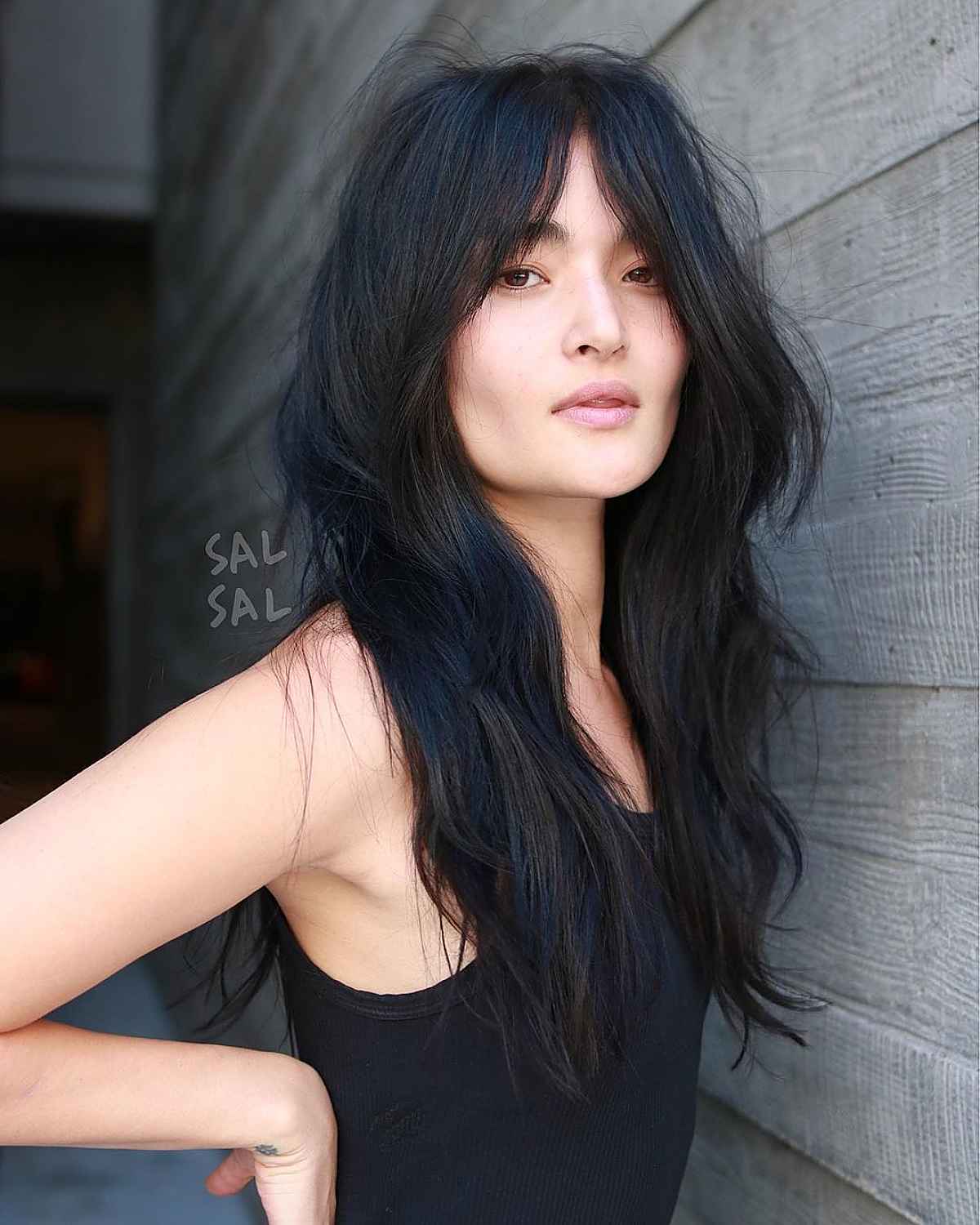 Layered Shag with Long Curtain Bangs for Square Faces 