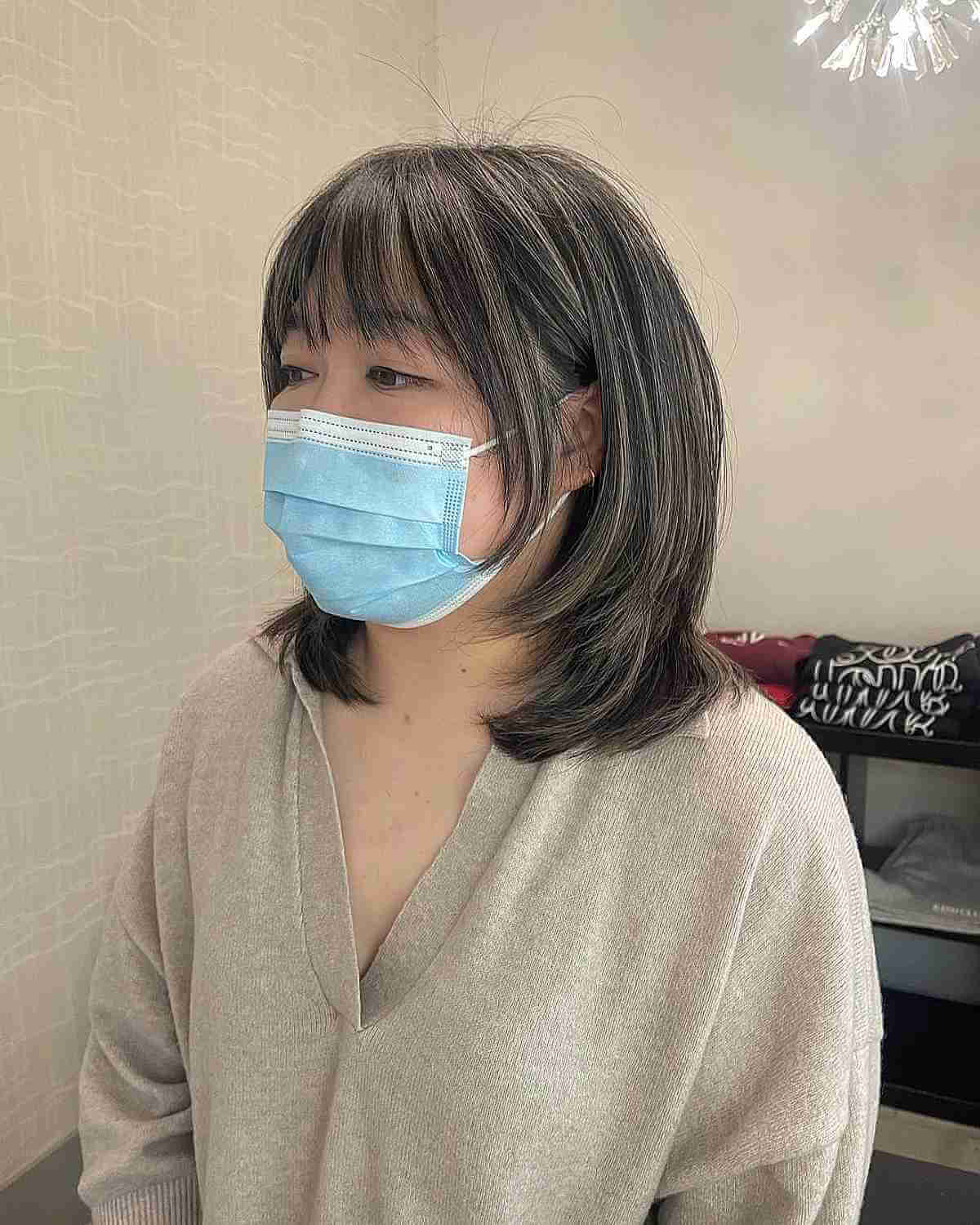 Medium Layers with Subtle Highlights on Shorter Hair