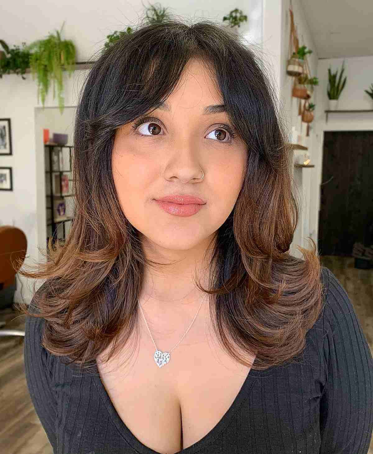 Medium Voluminous Bouncy Layers with Curtain Bangs