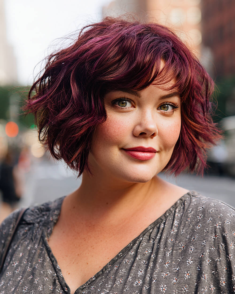 Messy plum bob haircut with choppy layers and bangs
