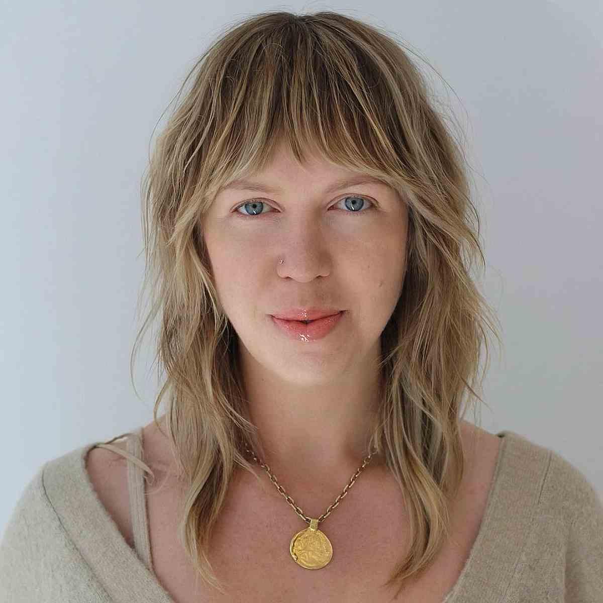 Mid-Length Messy Lob with Shaggy Layers and Bangs