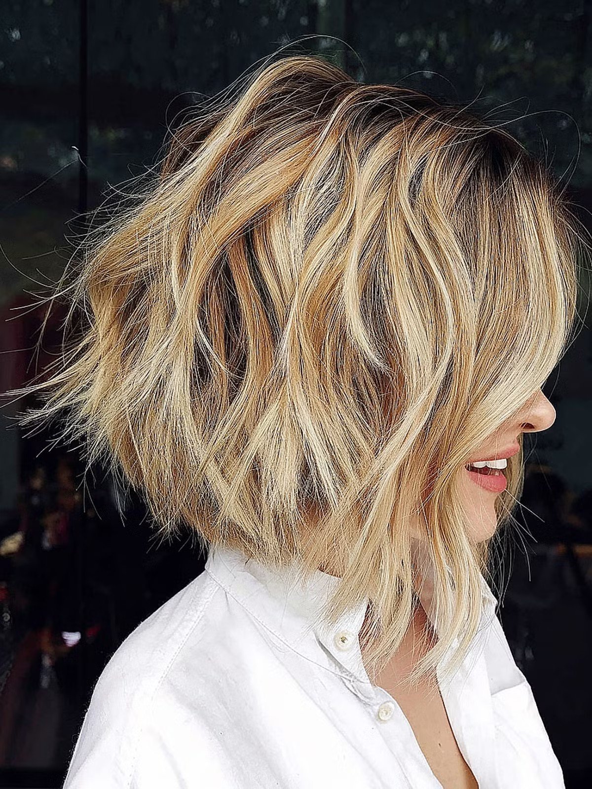 Short choppy haircuts featuring a layered choppy bob with textured ends and bangs