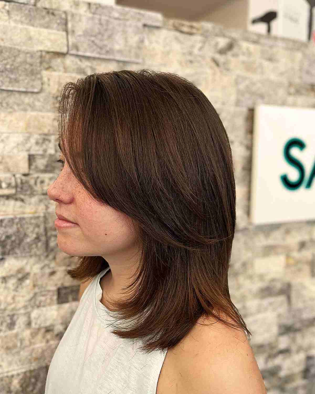 Short Medium Low-Maintenance Layered Hair with Long Bangs