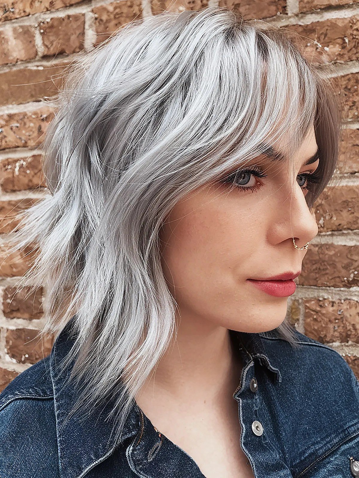 Silver wavy choppy bob with bangs