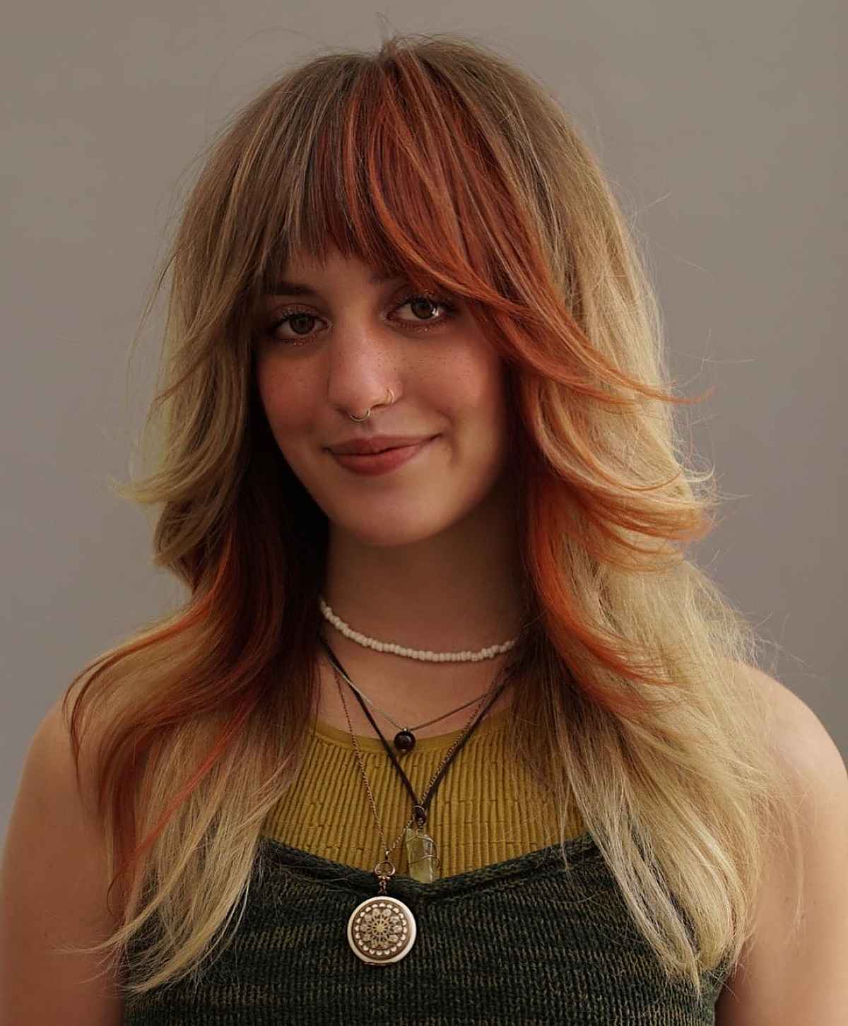 Straight Shaggy Hairstyle with Feathered Layers