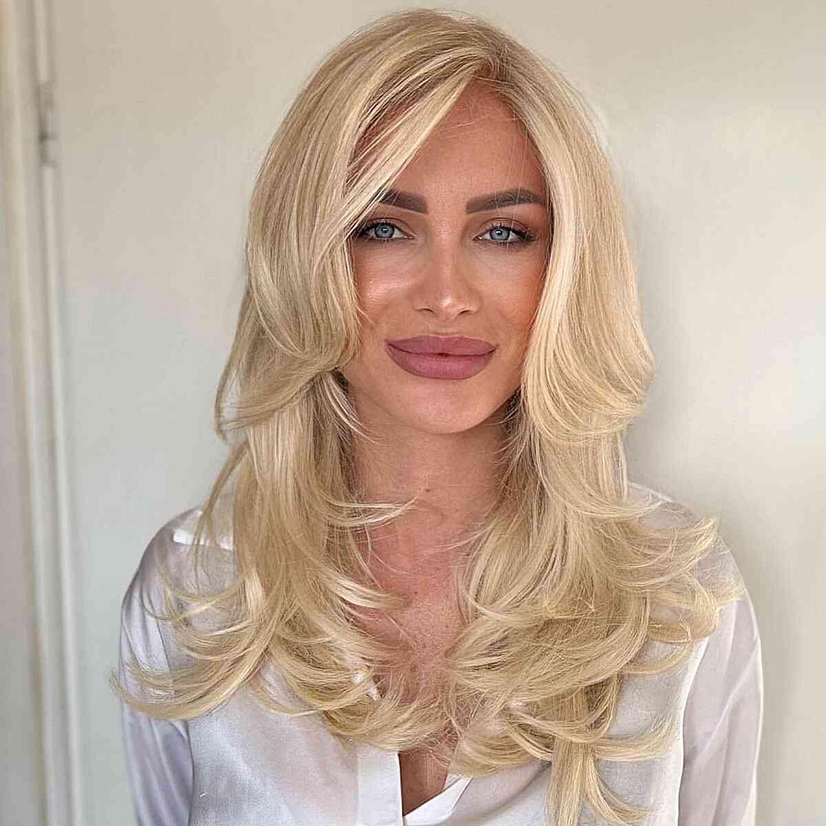 Straight Side-Parted Layers for women with mid-length blonde hair