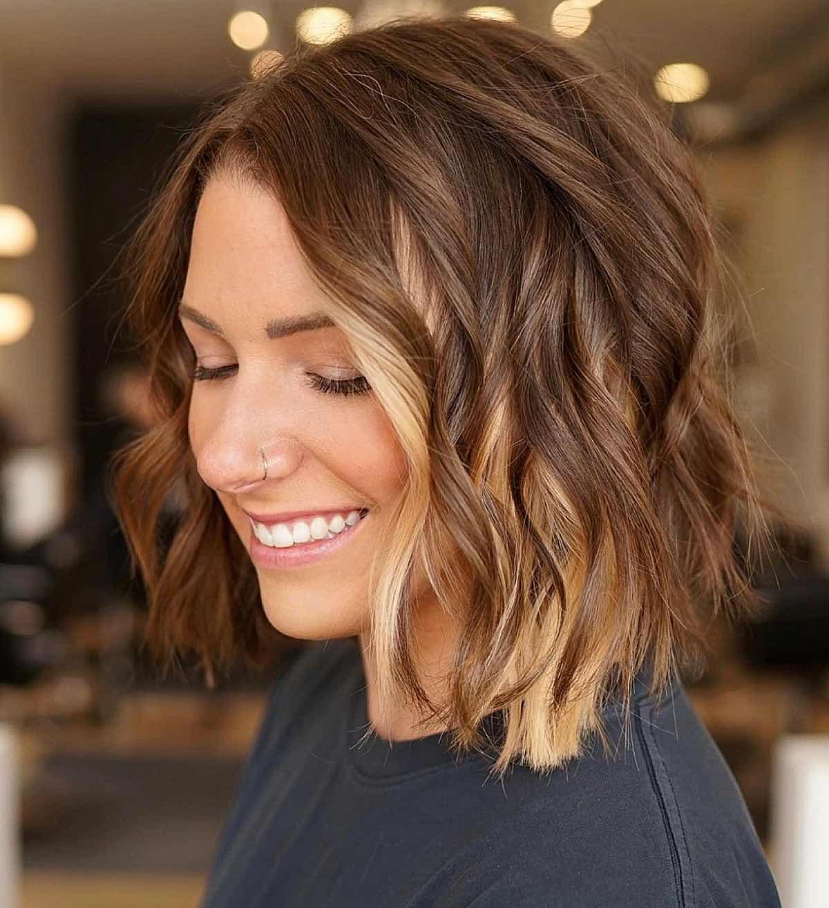 Subtle blonde peekaboo highlights on brown hair