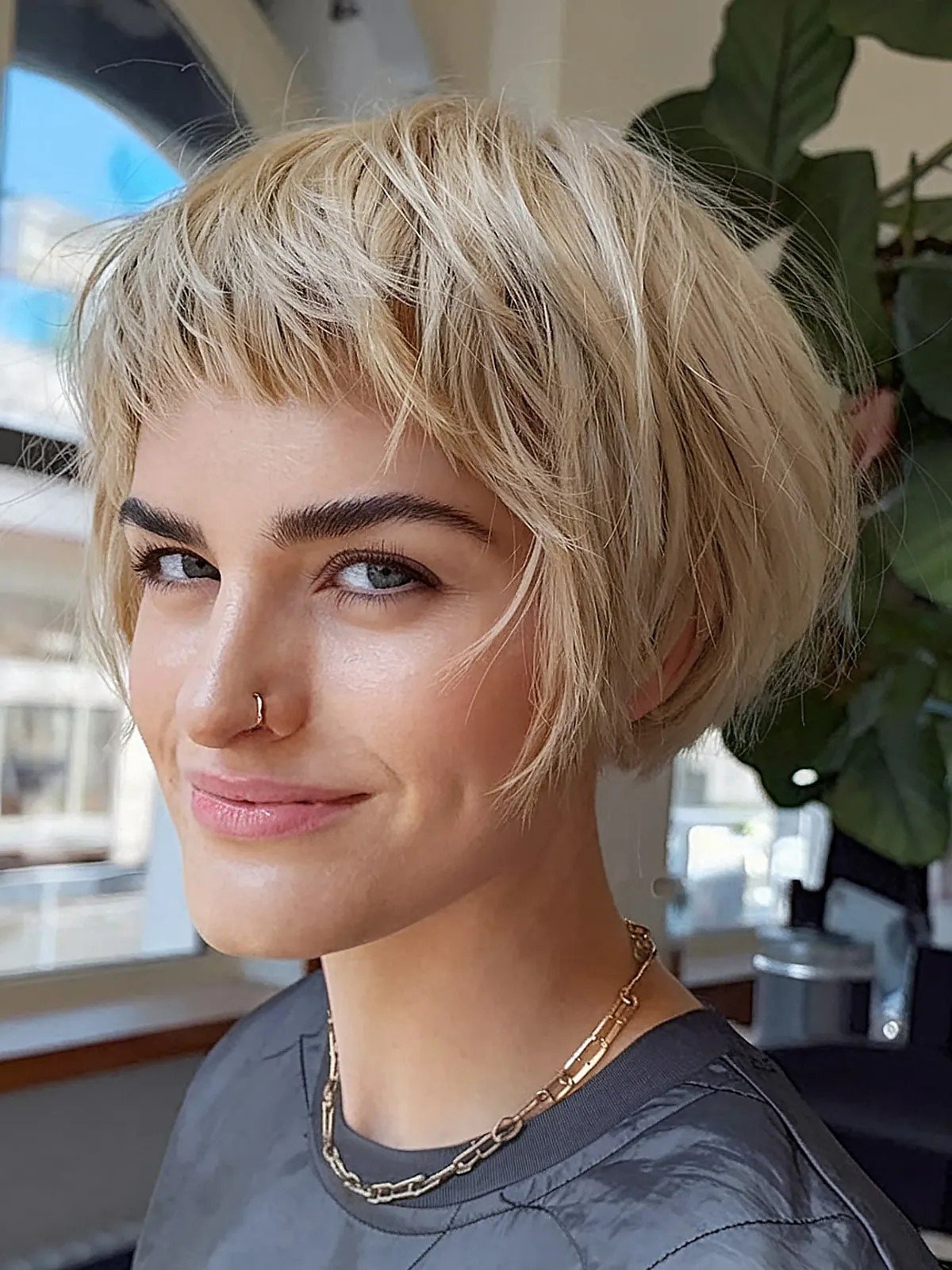 Very Short French Choppy Bob with Short Bangs Extra Layering That ends at the jawline
