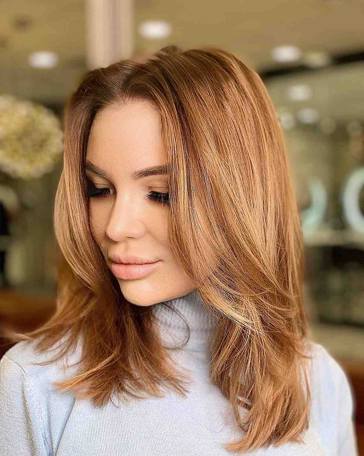 Voluminous blow out medium-length layers